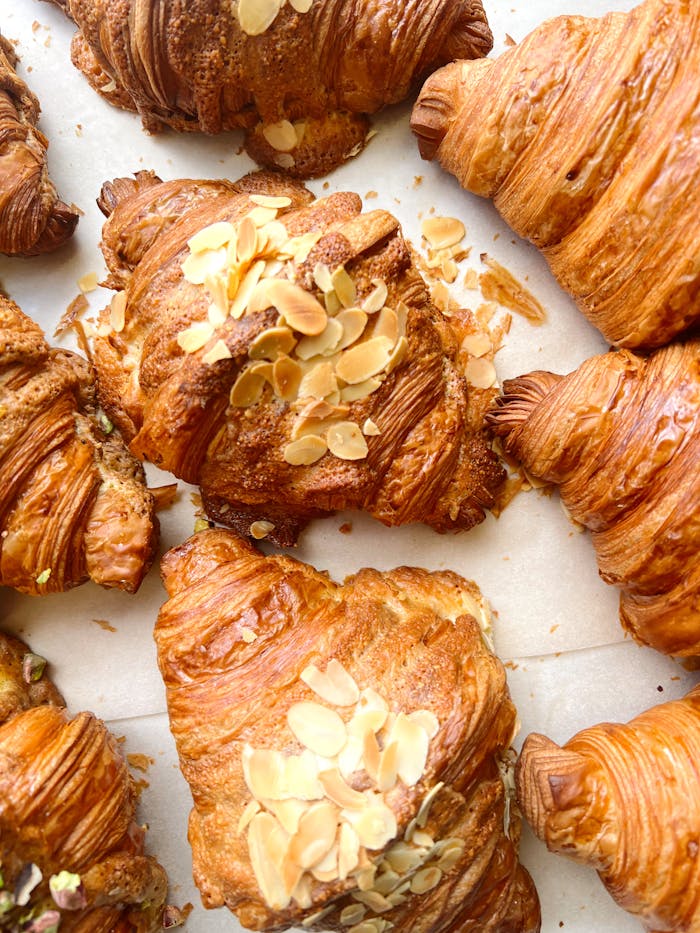 Mastering the First Impression: Your intriguing post title goes here Tempting almond-topped croissants showcasing golden layers.